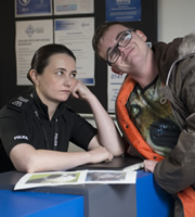 Scot Squad. Image shows from L to R: Sergeant Karen Ann Millar (Karen Bartke), Bobby Muir (Darren Connell). Copyright: The Comedy Unit. Scot Squad. Image shows from L to R: Sergeant Karen Ann Millar (Karen Bartke), Bobby Muir (Darren Connell). Copyright: The Comedy Unit.