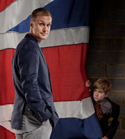 Spy. Image shows from L to R: Tim (Darren Boyd), Marcus (Jude Wright). Copyright: Hat Trick Productions. Spy. Image shows from L to R: Tim (Darren Boyd), Marcus (Jude Wright). Copyright: Hat Trick Productions.