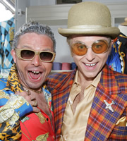 Star Stories. Image shows from L to R: Gianni Versace (Alex Woodhall), Elton John (Kevin Bishop). Copyright: Objective Productions. Star Stories. Image shows from L to R: Gianni Versace (Alex Woodhall), Elton John (Kevin Bishop). Copyright: Objective Productions.