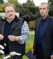 A Touch Of Cloth. Image shows from L to R: Bill Ball (Brian Cox), Jack Cloth (John Hannah). Copyright: Zeppotron. A Touch Of Cloth. Image shows from L to R: Bill Ball (Brian Cox), Jack Cloth (John Hannah). Copyright: Zeppotron.