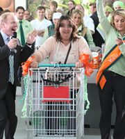 Trollied. Image shows from L to R: Gavin (Jason Watkins), Millionth Customer (Ashley McGuire), Katie (Chanel Cresswell). Copyright: Roughcut Television. Trollied. Image shows from L to R: Gavin (Jason Watkins), Millionth Customer (Ashley McGuire), Katie (Chanel Cresswell). Copyright: Roughcut Television.