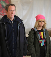 Trollied. Image shows from L to R: Neville (Dominic Coleman), Sophie (Georgia Henshaw). Copyright: Roughcut Television. Trollied. Image shows from L to R: Neville (Dominic Coleman), Sophie (Georgia Henshaw). Copyright: Roughcut Television.