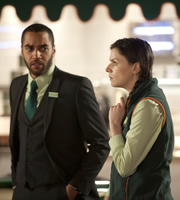Trollied. Image shows from L to R: Daniel (Samuel Anderson), Charlie (Aisling Bea). Copyright: Roughcut Television. Trollied. Image shows from L to R: Daniel (Samuel Anderson), Charlie (Aisling Bea). Copyright: Roughcut Television.