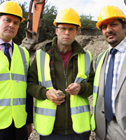 Twenty Twelve. Image shows from L to R: Ian Fletcher (Hugh Bonneville), Richard Watson (Simon Scardifield), Martin Soper (Nitin Ganatra). Copyright: BBC. Twenty Twelve. Image shows from L to R: Ian Fletcher (Hugh Bonneville), Richard Watson (Simon Scardifield), Martin Soper (Nitin Ganatra). Copyright: BBC.