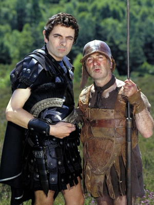 Blackadder. Image shows from L to R: Lord Edmund Blackadder V (Rowan Atkinson), Baldrick (Tony Robinson). Copyright: BBC / Tiger Aspect Productions. Blackadder. Image shows from L to R: Lord Edmund Blackadder V (Rowan Atkinson), Baldrick (Tony Robinson). Copyright: BBC / Tiger Aspect Productions.