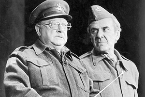 Dad's Army. Image shows from L to R: Captain Mainwaring (Arthur Lowe), Sergeant Wilson (John Le Mesurier). Copyright: BBC. Dad's Army. Image shows from L to R: Captain Mainwaring (Arthur Lowe), Sergeant Wilson (John Le Mesurier). Copyright: BBC.