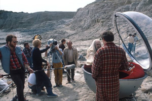 The Hitchhiker's Guide To The Galaxy. Image shows from L to R: Slartibartfast (Richard Vernon), Arthur Dent (Simon Jones). Copyright: BBC. The Hitchhiker's Guide To The Galaxy. Image shows from L to R: Slartibartfast (Richard Vernon), Arthur Dent (Simon Jones). Copyright: BBC.