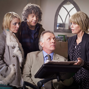 Jonathan Creek. Image shows from L to R: Joey Ross (Sheridan Smith), D.I. Gideon Pryke (Rik Mayall), Jonathan Creek (Alan Davies), Rosalind Tartikoff (Joanna Lumley). Copyright: BBC. Jonathan Creek. Image shows from L to R: Joey Ross (Sheridan Smith), D.I. Gideon Pryke (Rik Mayall), Jonathan Creek (Alan Davies), Rosalind Tartikoff (Joanna Lumley). Copyright: BBC.
