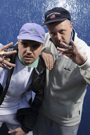 People Just Do Nothing. Image shows from L to R: Grindah (Allan Mustafa), Beats (Hugo Chegwin). Copyright: Roughcut Television. People Just Do Nothing. Image shows from L to R: Grindah (Allan Mustafa), Beats (Hugo Chegwin). Copyright: Roughcut Television.