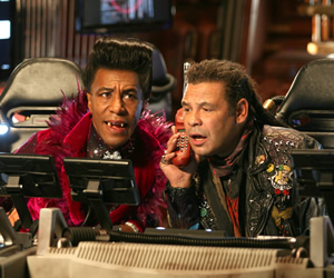 Red Dwarf. Image shows from L to R: Cat (Danny John-Jules), Lister (Craig Charles). Copyright: Grant Naylor Productions / BBC. Red Dwarf. Image shows from L to R: Cat (Danny John-Jules), Lister (Craig Charles). Copyright: Grant Naylor Productions / BBC.