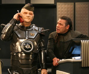Red Dwarf. Image shows from L to R: Kryten (Robert Llewellyn), Lister (Craig Charles). Copyright: Grant Naylor Productions / BBC. Red Dwarf. Image shows from L to R: Kryten (Robert Llewellyn), Lister (Craig Charles). Copyright: Grant Naylor Productions / BBC.