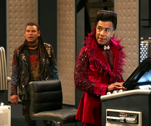 Red Dwarf. Image shows from L to R: Lister (Craig Charles), Cat (Danny John-Jules). Copyright: Grant Naylor Productions / BBC. Red Dwarf. Image shows from L to R: Lister (Craig Charles), Cat (Danny John-Jules). Copyright: Grant Naylor Productions / BBC.