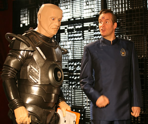 Red Dwarf. Image shows from L to R: Kryten (Robert Llewellyn), Rimmer (Chris Barrie). Copyright: Grant Naylor Productions / BBC. Red Dwarf. Image shows from L to R: Kryten (Robert Llewellyn), Rimmer (Chris Barrie). Copyright: Grant Naylor Productions / BBC.