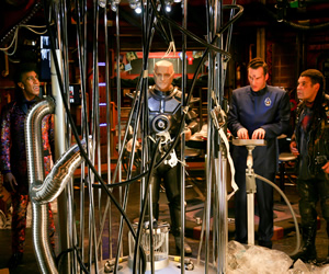 Red Dwarf. Image shows from L to R: Cat (Danny John-Jules), Kryten (Robert Llewellyn), Rimmer (Chris Barrie), Lister (Craig Charles). Copyright: Grant Naylor Productions / BBC. Red Dwarf. Image shows from L to R: Cat (Danny John-Jules), Kryten (Robert Llewellyn), Rimmer (Chris Barrie), Lister (Craig Charles). Copyright: Grant Naylor Productions / BBC.