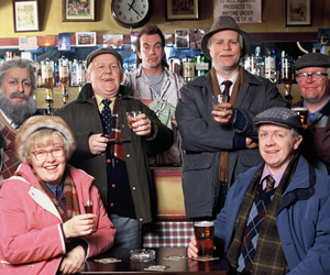 Still Game. Image shows from L to R: Navid Harrid (Sanjeev Kohli), Isa Drennan (Jane McCarry), Jack Jarvis (Ford Kiernan), Boabby (Gavin Mitchell), Victor McDade (Greg Hemphill), Tam Mullen (Mark Cox), Winston Ingram (Paul Riley). Copyright: The Comedy Unit / Effingee Productions. Still Game. Image shows from L to R: Navid Harrid (Sanjeev Kohli), Isa Drennan (Jane McCarry), Jack Jarvis (Ford Kiernan), Boabby (Gavin Mitchell), Victor McDade (Greg Hemphill), Tam Mullen (Mark Cox), Winston Ingram (Paul Riley). Copyright: The Comedy Unit / Effingee Productions.