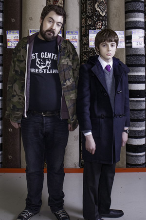 Uncle. Image shows from L to R: Andy (Nick Helm), Errol (Elliot Speller-Gillott). Copyright: Baby Cow Productions. Uncle. Image shows from L to R: Andy (Nick Helm), Errol (Elliot Speller-Gillott). Copyright: Baby Cow Productions.