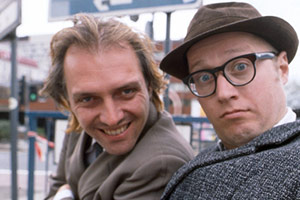 Bottom. Image shows from L to R: Richie Richard (Rik Mayall), Eddie Hitler (Adrian Edmondson). Copyright: BBC. Bottom. Image shows from L to R: Richie Richard (Rik Mayall), Eddie Hitler (Adrian Edmondson). Copyright: BBC.