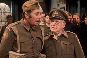 Dad's Army. Image shows from L to R: Private Walker (James Beck), Captain Mainwaring (Arthur Lowe). Copyright: BBC. Dad's Army. Image shows from L to R: Private Walker (James Beck), Captain Mainwaring (Arthur Lowe). Copyright: BBC.