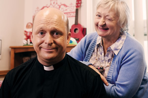 Hospital People. Image shows from L to R: Father Kenny (Tom Binns), Mrs Leydon (Janine Duvitski). Copyright: Roughcut Television. Hospital People. Image shows from L to R: Father Kenny (Tom Binns), Mrs Leydon (Janine Duvitski). Copyright: Roughcut Television.