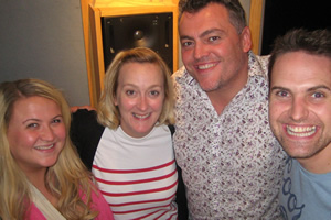 Lewis Macleod's Wired News. Image shows from L to R: Leah MacRae, Anita Corduroy (Gabriel Quigley), Lewis (Lewis Macleod), Gerry MacLaughlin. Copyright: The Comedy Unit. Lewis Macleod's Wired News. Image shows from L to R: Leah MacRae, Anita Corduroy (Gabriel Quigley), Lewis (Lewis Macleod), Gerry MacLaughlin. Copyright: The Comedy Unit.