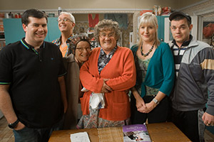 Mrs. Brown's Boys. Image shows from L to R: Dermot Brown (Paddy Houlihan), Rory Brown (Rory Cowan), Winnie McGoogan (Eilish O'Carroll), Agnes Brown (Brendan O'Carroll), Cathy Brown (Jennifer Gibney), Buster Brady (Danny O'Carroll). Copyright: BBC. Mrs. Brown's Boys. Image shows from L to R: Dermot Brown (Paddy Houlihan), Rory Brown (Rory Cowan), Winnie McGoogan (Eilish O'Carroll), Agnes Brown (Brendan O'Carroll), Cathy Brown (Jennifer Gibney), Buster Brady (Danny O'Carroll). Copyright: BBC.