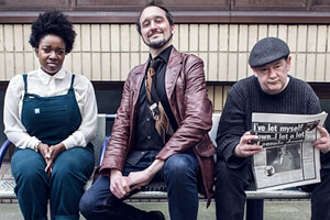 Phil Ellis Is Trying. Image shows from L to R: Lolly (Lolly Adefope), Phil (Phil Ellis), Johnny (Johnny Vegas). Copyright: BBC. Phil Ellis Is Trying. Image shows from L to R: Lolly (Lolly Adefope), Phil (Phil Ellis), Johnny (Johnny Vegas). Copyright: BBC.