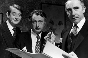Yes Minister. Image shows from L to R: Bernard Woolley (Derek Fowlds), James Hacker (Paul Eddington), Sir Humphrey Appleby (Nigel Hawthorne). Copyright: BBC. Yes Minister. Image shows from L to R: Bernard Woolley (Derek Fowlds), James Hacker (Paul Eddington), Sir Humphrey Appleby (Nigel Hawthorne). Copyright: BBC.