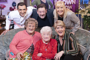 All Round To Mrs. Brown's. Image shows from L to R: Aly Mahmoud, Mrs Brown (Brendan O'Carroll), Johnny Vegas, Patricia Pennington, Clare Balding, Cathy Brown (Jennifer Gibney). All Round To Mrs. Brown's. Image shows from L to R: Aly Mahmoud, Mrs Brown (Brendan O'Carroll), Johnny Vegas, Patricia Pennington, Clare Balding, Cathy Brown (Jennifer Gibney).