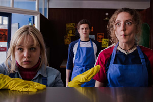 Derry Girls. Image shows from L to R: Clare Devlin (Nicola Coughlan), James Maguire (Dylan Llewellyn), Orla McCool (Louisa Harland). Copyright: Hat Trick Productions. Derry Girls. Image shows from L to R: Clare Devlin (Nicola Coughlan), James Maguire (Dylan Llewellyn), Orla McCool (Louisa Harland). Copyright: Hat Trick Productions.