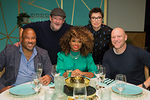 I'll Get This. Image shows from L to R: John Barnes, Johnny Vegas, Fleur East, Sue Perkins, Mike Tindall. Copyright: 12 Yard Productions. I'll Get This. Image shows from L to R: John Barnes, Johnny Vegas, Fleur East, Sue Perkins, Mike Tindall. Copyright: 12 Yard Productions.