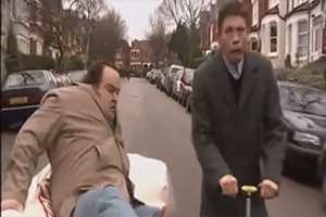 Lee Evans - So What Now?. Image shows from L to R: Stuart (Steven O'Donnell), Lee (Lee Evans). Copyright: Little Mo Films. Lee Evans - So What Now?. Image shows from L to R: Stuart (Steven O'Donnell), Lee (Lee Evans). Copyright: Little Mo Films.