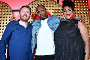 Live At The Apollo. Image shows from L to R: Chris McCausland, Dane Baptiste, Desiree Burch. Copyright: Open Mike Productions. Live At The Apollo. Image shows from L to R: Chris McCausland, Dane Baptiste, Desiree Burch. Copyright: Open Mike Productions.