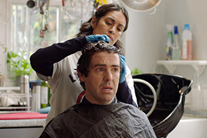 Motherland. Image shows from L to R: Kevin (Paul Ready), Laura (Emily Lloyd Saini). Motherland. Image shows from L to R: Kevin (Paul Ready), Laura (Emily Lloyd Saini).