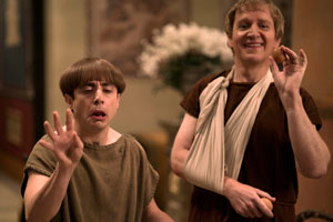 Plebs. Image shows from L to R: Grumio (Ryan Sampson), Terrence (Matthew Cottle). Copyright: RISE Films. Plebs. Image shows from L to R: Grumio (Ryan Sampson), Terrence (Matthew Cottle). Copyright: RISE Films.
