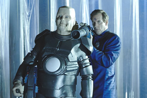 Red Dwarf. Image shows from L to R: Kryten (Robert Llewellyn), Rimmer (Chris Barrie). Red Dwarf. Image shows from L to R: Kryten (Robert Llewellyn), Rimmer (Chris Barrie).