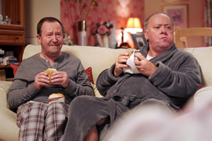 Two Doors Down. Image shows from L to R: Colin (Jonathan Watson), Eric (Alex Norton). Copyright: BBC. Two Doors Down. Image shows from L to R: Colin (Jonathan Watson), Eric (Alex Norton). Copyright: BBC.
