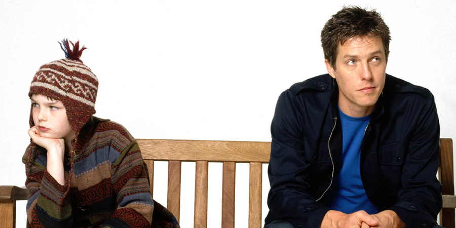 About A Boy. Image shows from L to R: Marcus (Nicholas Hoult), Will Freeman (Hugh Grant). About A Boy. Image shows from L to R: Marcus (Nicholas Hoult), Will Freeman (Hugh Grant).