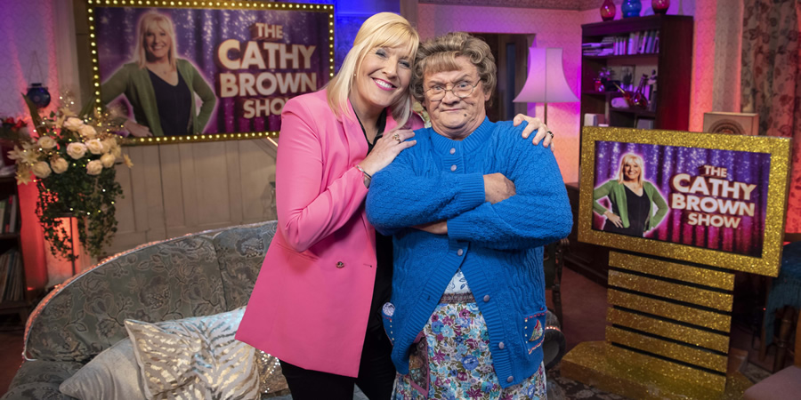 All Round To Mrs. Brown's. Image shows from L to R: Cathy Brown (Jennifer Gibney), Mrs Brown (Brendan O'Carroll). All Round To Mrs. Brown's. Image shows from L to R: Cathy Brown (Jennifer Gibney), Mrs Brown (Brendan O'Carroll).