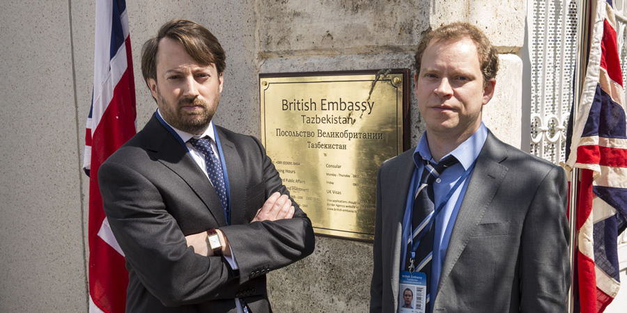 Ambassadors. Image shows from L to R: Keith Davis (David Mitchell), Neil Tilly (Robert Webb). Ambassadors. Image shows from L to R: Keith Davis (David Mitchell), Neil Tilly (Robert Webb).