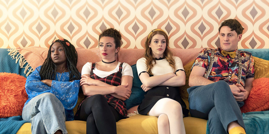 The Amelia Gething Complex. Image shows from L to R: Vinny (Jasmin Hinds), Poppy (Natalia Hinds), Amelia (Amelia Gething), Wallace (Alex Griffin-Griffiths). Copyright: BBC. The Amelia Gething Complex. Image shows from L to R: Vinny (Jasmin Hinds), Poppy (Natalia Hinds), Amelia (Amelia Gething), Wallace (Alex Griffin-Griffiths). Copyright: BBC.