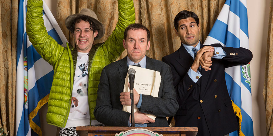 Asylum. Image shows from L to R: Ludo (Dustin Demri-Burns), Dan Hern (Ben Miller), Rafael Castillo (Kayvan Novak). Asylum. Image shows from L to R: Ludo (Dustin Demri-Burns), Dan Hern (Ben Miller), Rafael Castillo (Kayvan Novak).
