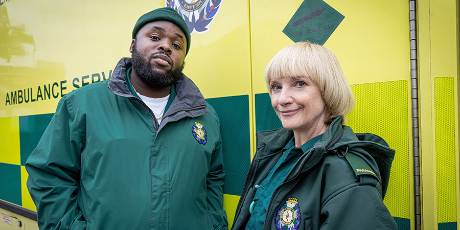 Bloods. Image shows from L to R: Maleek (Samson Kayo), Wendy (Jane Horrocks). Copyright: Roughcut Television. Bloods. Image shows from L to R: Maleek (Samson Kayo), Wendy (Jane Horrocks). Copyright: Roughcut Television.