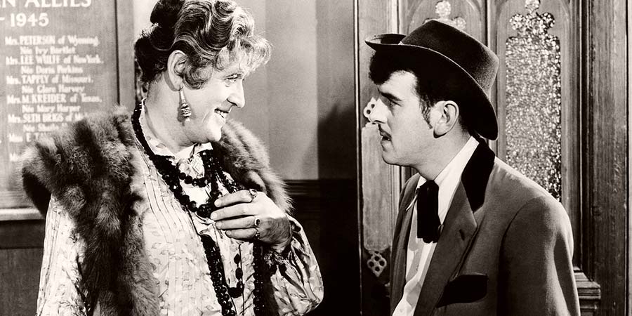 Blue Murder At St. Trinian's. Image shows from L to R: Miss Fritton (Alastair Sim), Flash Harry (George Cole). Copyright: John Harvel Productions / STUDIOCANAL. Blue Murder At St. Trinian's. Image shows from L to R: Miss Fritton (Alastair Sim), Flash Harry (George Cole). Copyright: John Harvel Productions / STUDIOCANAL.