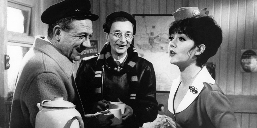 Carry On Cabby. Image shows from L to R: Charlie Hawkins (Sid James), Terry 'Pintpot' Tankard (Charles Hawtrey), Anthea (Amanda Barrie). Copyright: Peter Rogers Productions / Studio Canal. Carry On Cabby. Image shows from L to R: Charlie Hawkins (Sid James), Terry 'Pintpot' Tankard (Charles Hawtrey), Anthea (Amanda Barrie). Copyright: Peter Rogers Productions / Studio Canal.