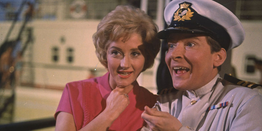 Carry On Cruising. Image shows from L to R: Gladys 'Glad' Trimble (Liz Fraser), First Officer Leonard Marjoribanks (Kenneth Williams). Carry On Cruising. Image shows from L to R: Gladys 'Glad' Trimble (Liz Fraser), First Officer Leonard Marjoribanks (Kenneth Williams).