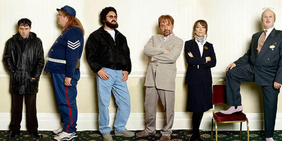 Catterick. Image shows from L to R: Tony (Reece Shearsmith), Mark (Mark Benton), Chris (Vic Reeves), Carl (Bob Mortimer), Tess (Morwenna Banks), Roy Oates (Matt Lucas). Catterick. Image shows from L to R: Tony (Reece Shearsmith), Mark (Mark Benton), Chris (Vic Reeves), Carl (Bob Mortimer), Tess (Morwenna Banks), Roy Oates (Matt Lucas).