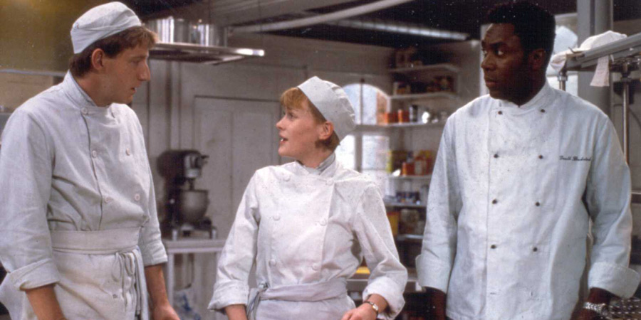Chef!. Image shows from L to R: Greg (William Ivory), Lucinda (Claire Skinner), Gareth Blackstock (Lenny Henry). Copyright: Crucial Films. Chef!. Image shows from L to R: Greg (William Ivory), Lucinda (Claire Skinner), Gareth Blackstock (Lenny Henry). Copyright: Crucial Films.