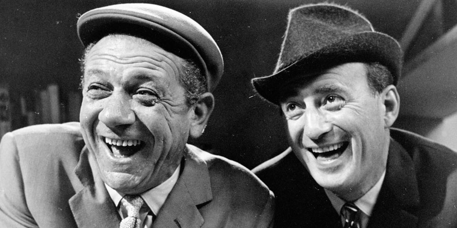 Citizen James. Image shows from L to R: Sid (Sid James), Charlie Davenport (Sydney Tafler). Copyright: BBC. Citizen James. Image shows from L to R: Sid (Sid James), Charlie Davenport (Sydney Tafler). Copyright: BBC.