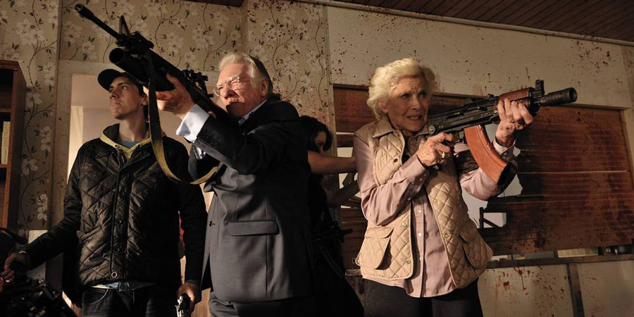 Cockneys Vs Zombies. Image shows from L to R: Terry (Rasmus Hardiker), Ray (Alan Ford), Peggy (Honor Blackman). Cockneys Vs Zombies. Image shows from L to R: Terry (Rasmus Hardiker), Ray (Alan Ford), Peggy (Honor Blackman).