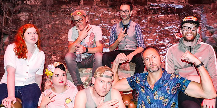 Comedian Rap Battles. Image shows from L to R: Eleanor Morton, Kirsty Morrison, Seymour Mace, Neil Bratchpiece, Will Naameh, Leo Kearse, Rob Mulholland. Copyright: BBC. Comedian Rap Battles. Image shows from L to R: Eleanor Morton, Kirsty Morrison, Seymour Mace, Neil Bratchpiece, Will Naameh, Leo Kearse, Rob Mulholland. Copyright: BBC.